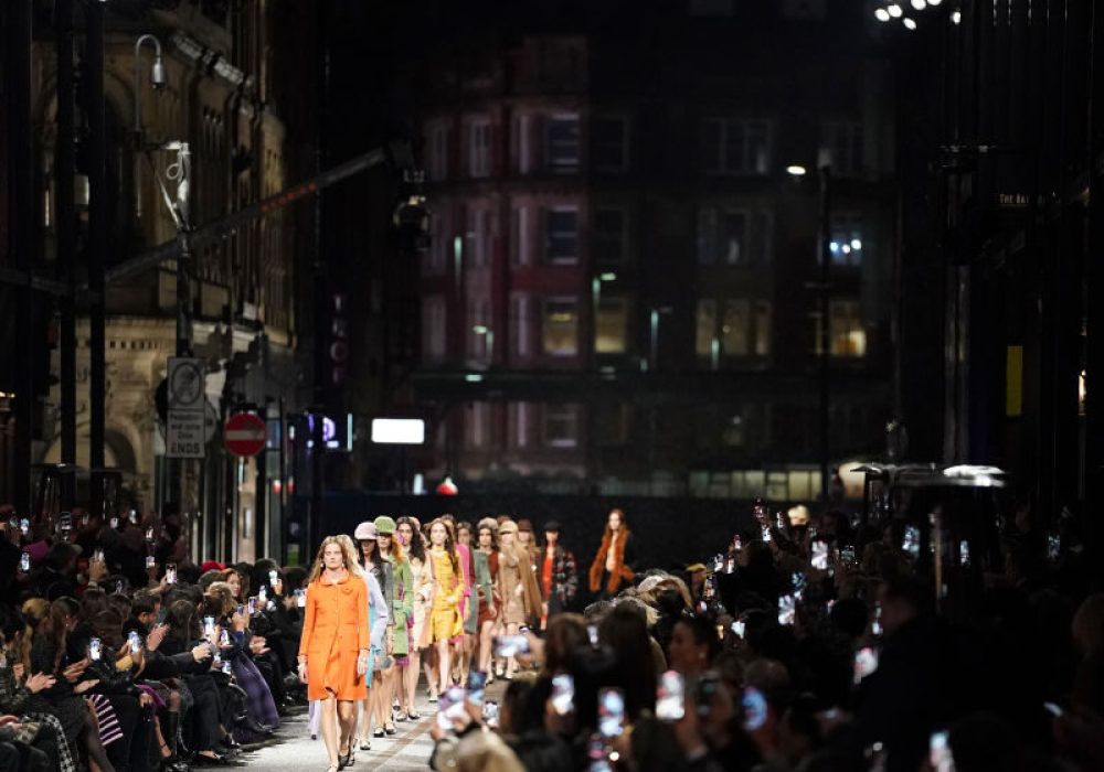 MANCHESTER, ENGLAND - DECEMBER 07: Models walk the runway during the CHANEL Metiers D'Art Fashion Show on December 07, 2023 in Manchester, England. (Photo by Dominic Lipinski/Getty Images)